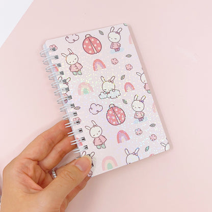 Bella and Rainbows | Spiral Grid Notebook (SNB01-POCKET)